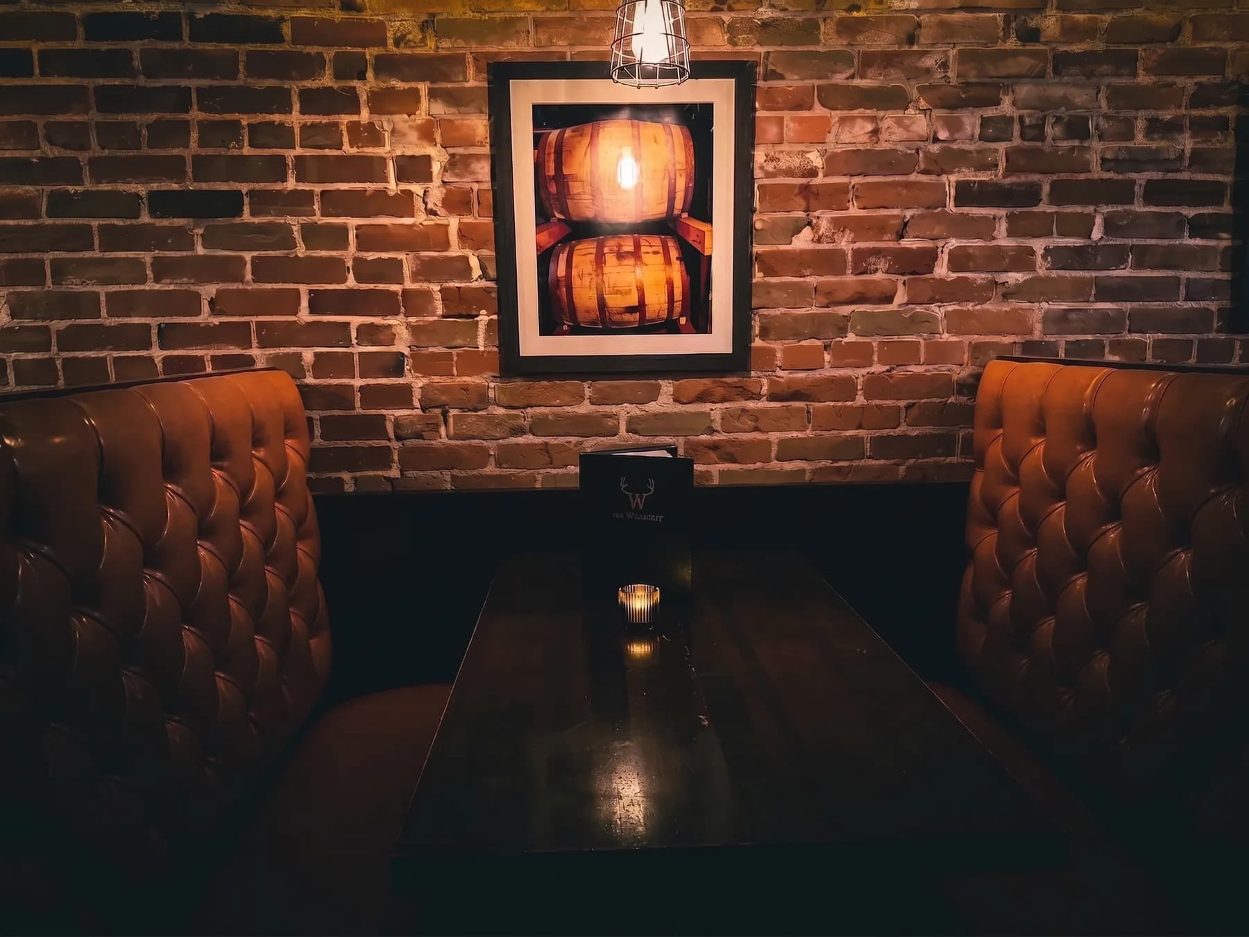 Booths and barrel art at The Whisk(e)y